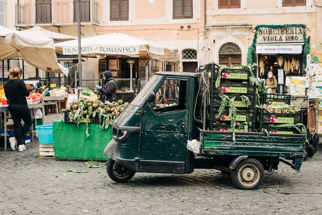 People selling artichokes in Campo de Fiori in Rome