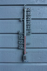 Thermometer showing negative five degrees Celsius
