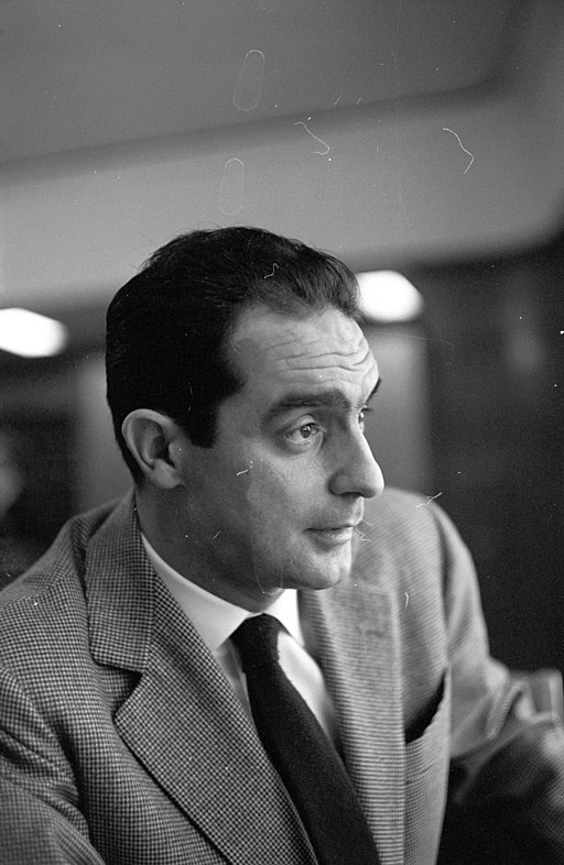 A black and white picture of Italo Calvino, a famous 20th century Italian writer