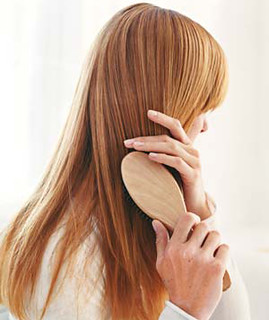 Person brushing their hair