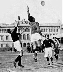 People playing soccer outside during the Fascist period in Italy