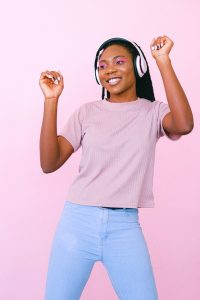 Person dancing with headphones