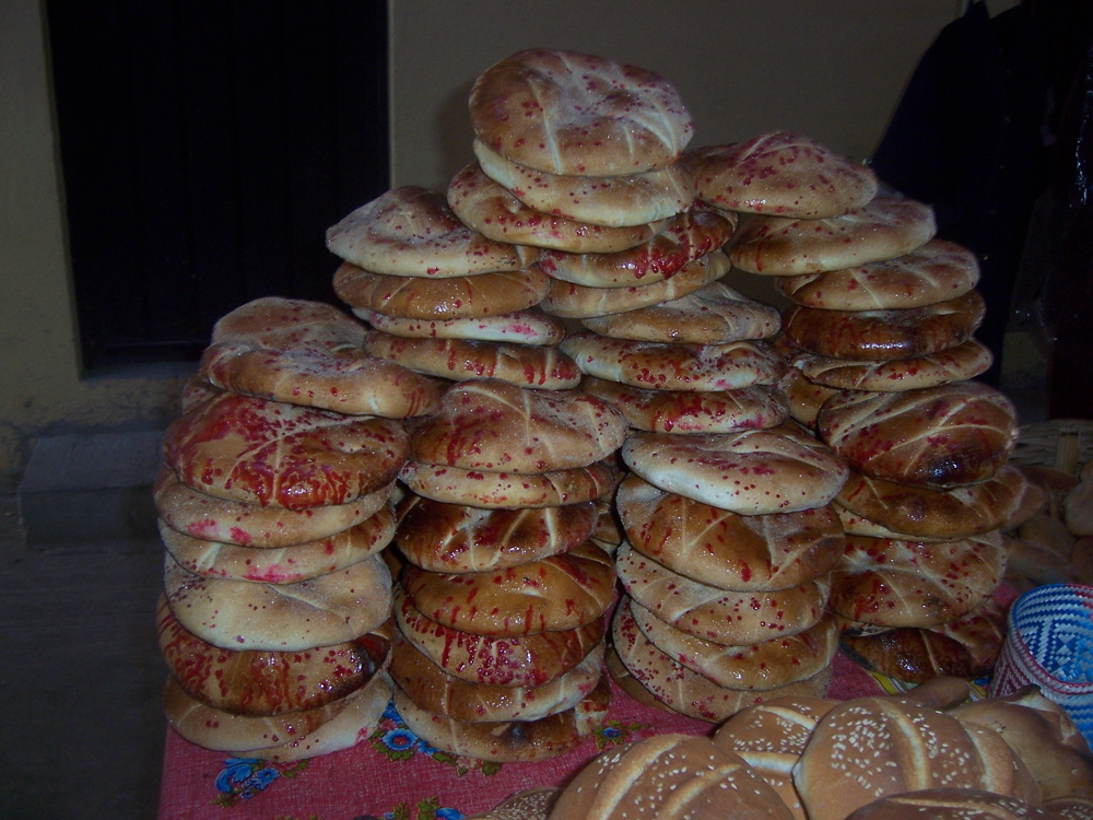 A large pile of sweet breads.